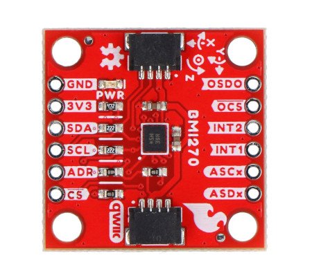 Červená sparkfun deska s 3osým akcelerometrem a gyroskopem leží na bílém pozadí.